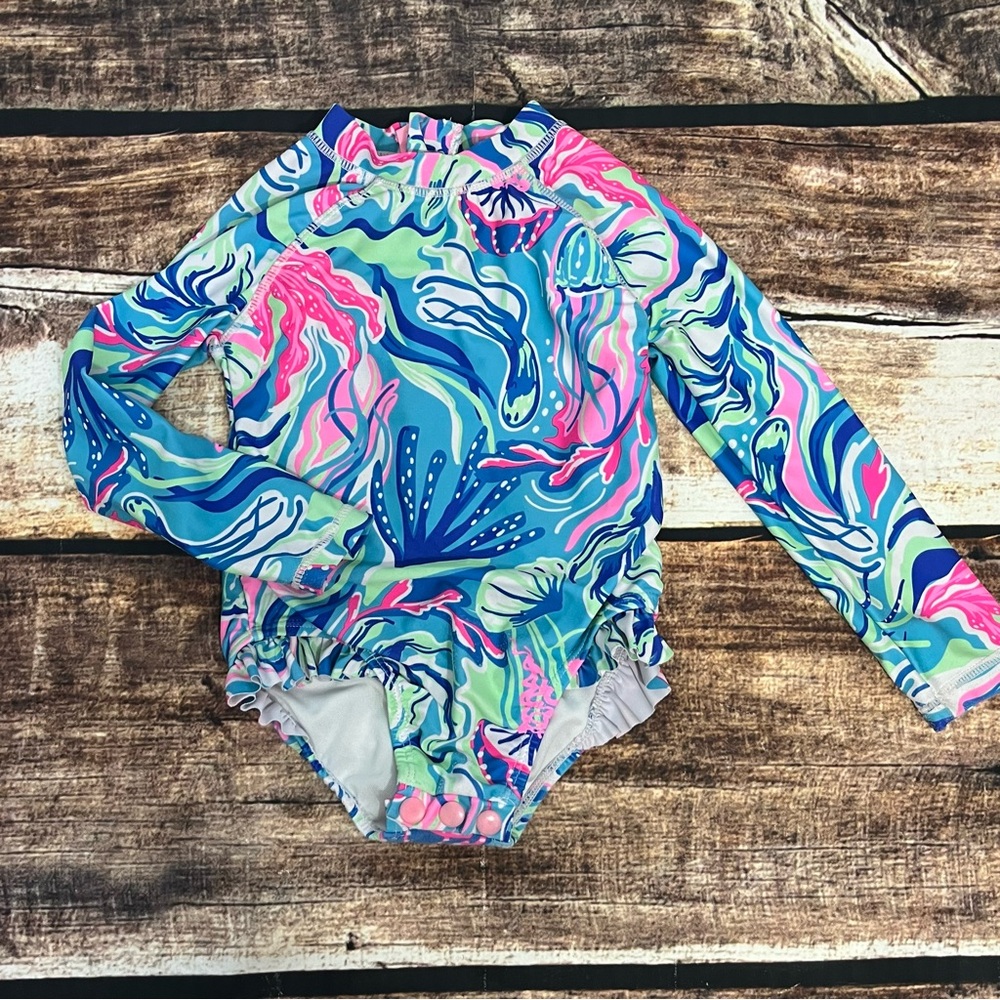 Colorful Kids Swim suit by Tommy Bahama is in like new condition size 2T